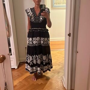 Brand new with tags. Absolutely gorgeous dress!!